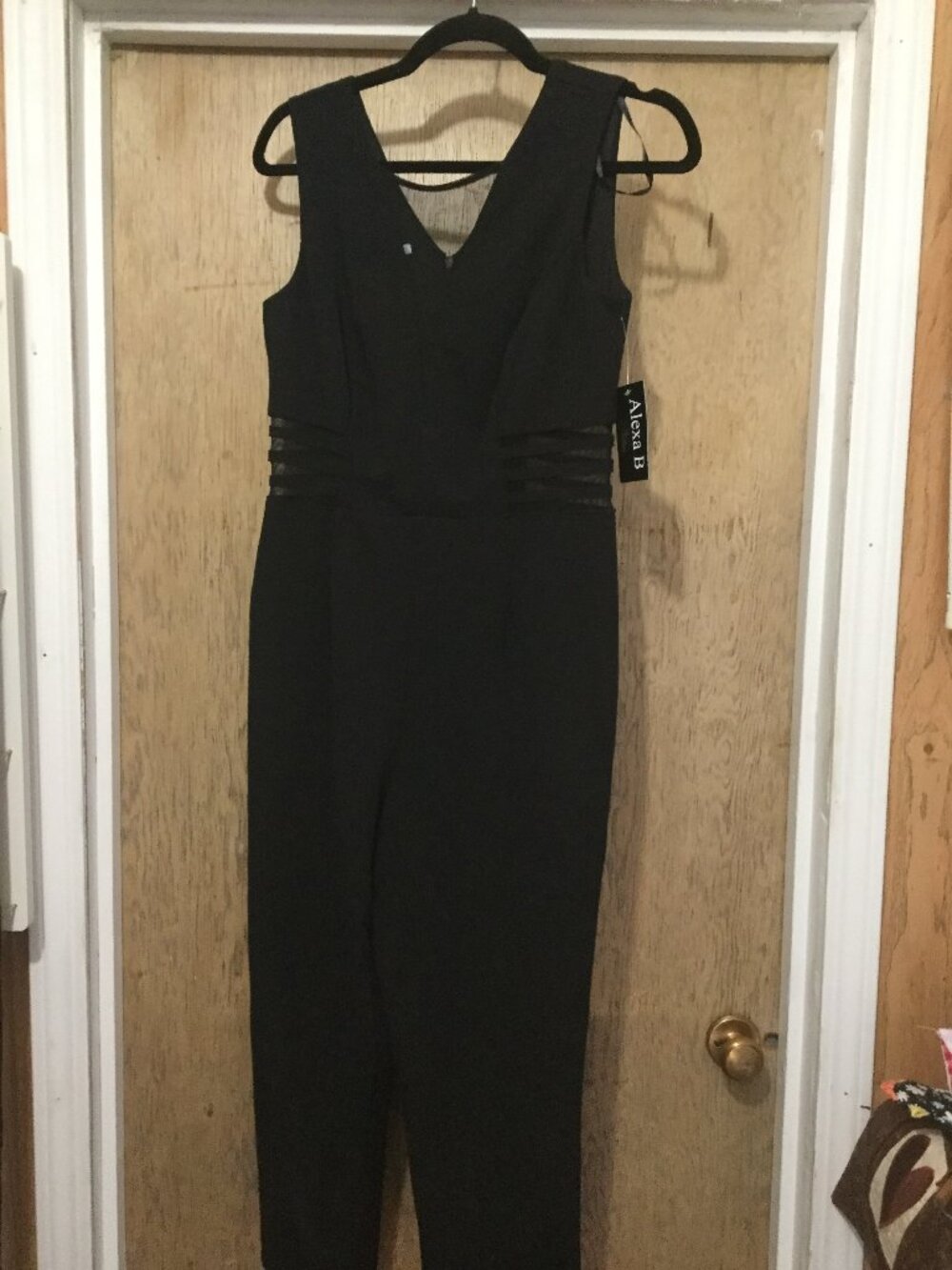 NWT Alexa B Nites Black jumpsuit with sheer panels at neck and waist area size 8